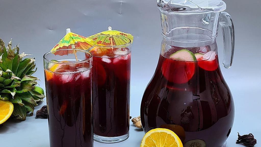 Hibiscus Juice · Our Natural Habiscus Juice is 100% organic with no added flavours, Sugar is present. Health Benefits of Habiscus Juice. 1. helping with weight loss. 2. helps with maintaining healthy eyes. 3. fights high blood pressure. 4. combats anemia. 5. supports the digestive system. 6. helps cure hypertension syndrome. 7. prevent early aging. 8. helps the liver function properly.