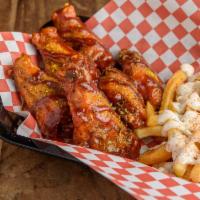 Wing Plate (6 Pc.) · Traditional bone-in wings served with fries and ranch dipping sauce.