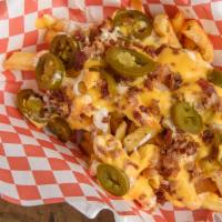 Regular Loaded Fries · Ranch, bacon, cheese, and jalapeño.