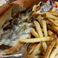 Philly Cheesesteak · Thinly sliced steak sautéed with green pepper, onion and mushrooms, topped with mozzarella c...