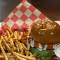Buffalo Chicken · Crispy chicken breast tossed in your favorite wing sauce served on a brioche bun with lettuc...