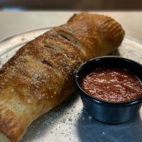 Meaty Stromboli · Stuffed with pepperoni, sausage, ground beef and mozzarella cheese. Stromboli filled with Pa...