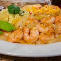 Camarones En Salsa Habanera · Shrimp cooked in our creamy habanero sauce. Served with our poblano rice.