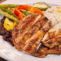 Mp- Jerk Chicken · Grilled seasoned jerk chicken breast over a bed of pineapple and sour cream sauce. Served wi...