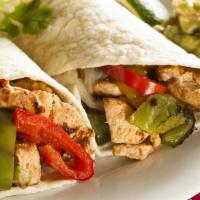 El Burro Grande · Strips of chicken, grilled with onions, bell pepper and tomato with beans rolled in large fl...