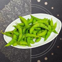 Edamame · Soy beans in the pod with garlic sauce.