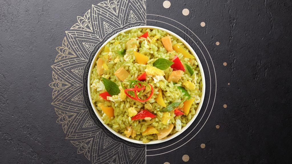 Hulkin' Curry Fried Rice · Stir fried rice with egg, basil, bell pepper, bamboo shoot and green curry paste. Spicy.