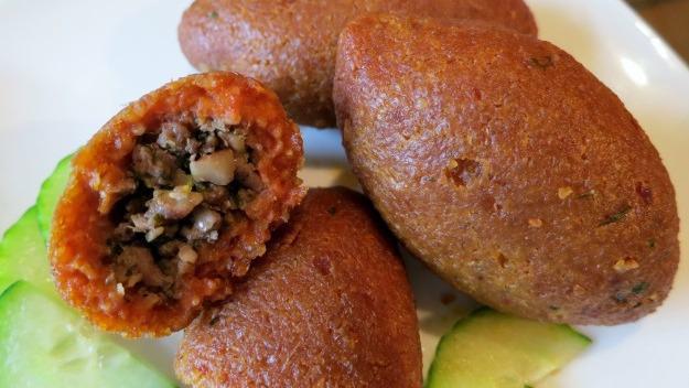 Kibbeh Plate · Made of bulgur (cracked wheat), minced onions, lean ground beef, pine nuts, and spices, fried in 100% vegetable oil.