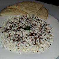 Fresh Feta Cheese Plate · Topped with zatar (a herb), e.v. olive oil, with pita.