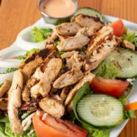 Buffalo Chicken Salad · Fresh grilled chicken breast topped in buffalo sauce on top of mixed greens with shredded mo...