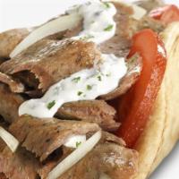 Classic Gyro · Our shaved signature lamb or chicken with romaine, tomatoes, onions, and our home-made tzatz...