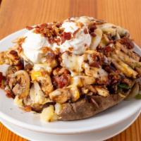 Buffalo Chicken Baked Potato · Grilled chicken breast, mushrooms, green peppers, onions, tossed in our ale house buffalo sa...