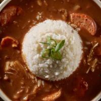 Gumbo With Chicken And Sausage Bowl · Onions, celery, peppers, and steamed rice. Served over steamed rice and with a side of Texas...