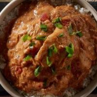 Drunken Chicken Bowl · Tender chicken with garlic, stewed tomatoes, spices, and beer. Served over steamed rice and ...