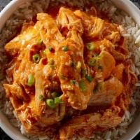 Buffalo Chicken Bowl · Tender chicken with celery, red onion, crushed red peppers, and sauce. Served over steamed r...