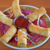 Spring Roll · Mixed vegetable roll pastries. Served with savory sauces.
