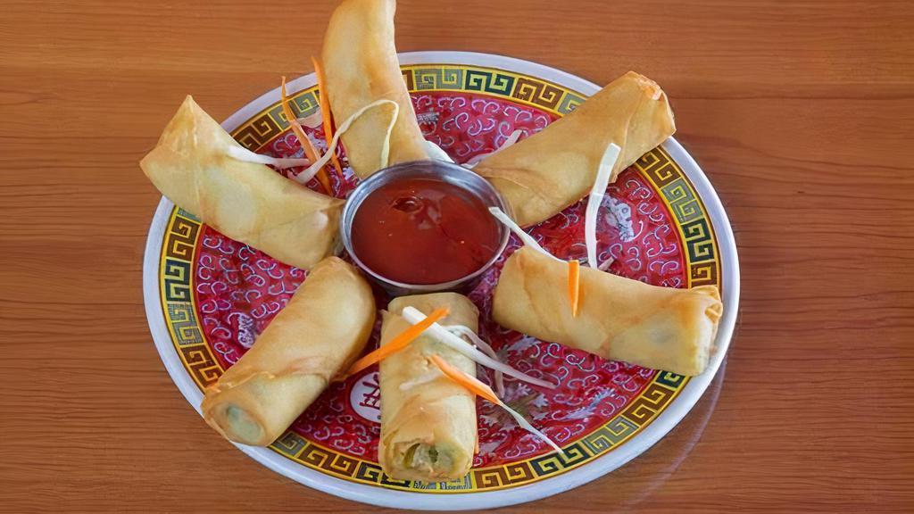 Spring Roll · Mixed vegetable roll pastries. Served with savory sauces.