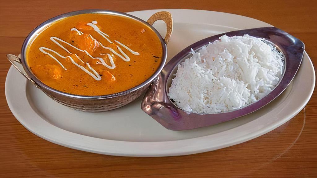 Chicken Tikka Masala · Boneless. Lightly broiled chicken cooked in a  savory tomato sauce, onions, and butter. Served with basmati rice.