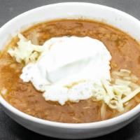 White Chili · Gluten-free. White beans and chicken topped with monterey jack cheese and sour cream.