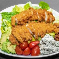 Fried Chicken Cobb  · Romaine lettuce, fried chicken, diced tomatoes, hard-boiled egg, fresh avocado, danish blue ...