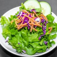 Bristol House Salad · Gluten-free, vegetarian. Fresh mixed greens with carrots, red cabbage, and cucumbers.