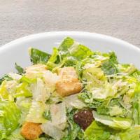 Classic Caesar · Crisp romaine lettuce tossed with a classic caesar dressing, Parmesan cheese, and croutons.