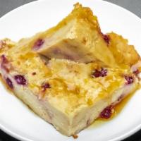 Cranberry Bread Pudding · Served with rum butter.