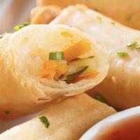 Veggie Spring Rolls (2Ps) · Vegetable mix served with sweet chili sauce. (V)