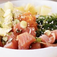 Hawaiian Poke Tuna Bowl · Ahi tuna, seaweed salad, avocado, pineapple, masago, sesame seed and poke sauce.