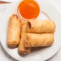 Spring Rolls · four fried spring rolls prepared with chicken, shrimp, glass noodles, carrots, and cabbage s...