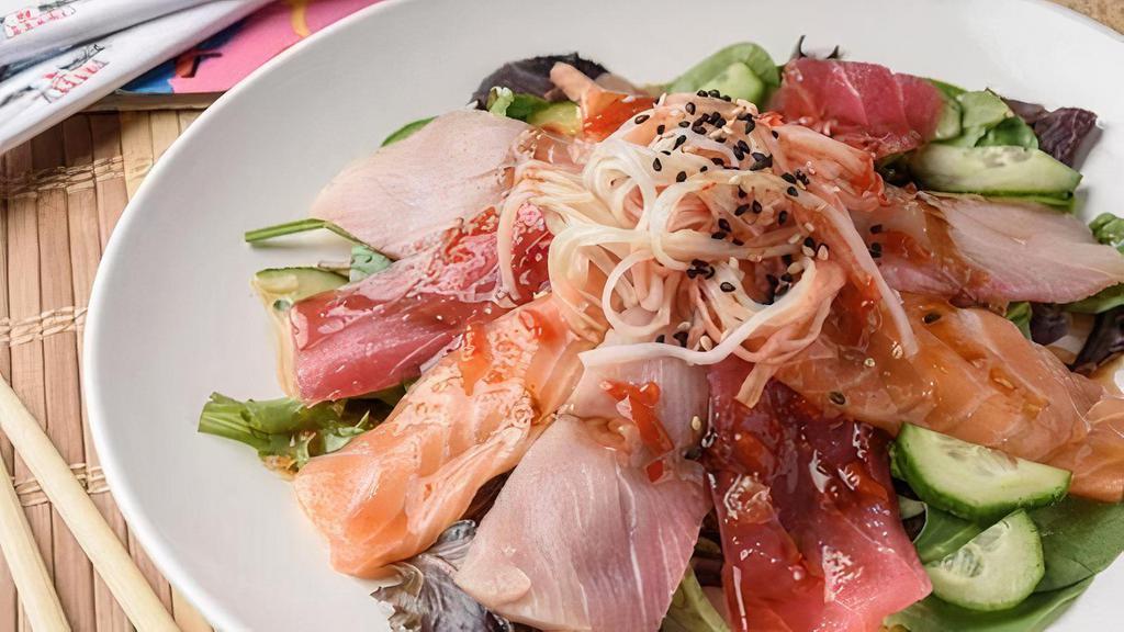 Spicy Sashimi Salad · Three sashimi rock stars - red tuna, salmon, yellowtail, crab stick and cucumber piled on spring mix with our house made ginger dressing and sesame seeds. Spicy.