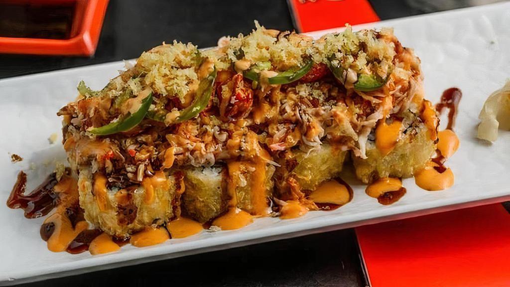 Vip Roll · Fried or Baked. Shrimp tempura, crab stick, cream cheese inside, fully fried OR baked, with Cajun seasoned crawfish, baked krabmeat, jalapeno, spicy mayo, sweet chili, eel sauce and crunchy flakes.