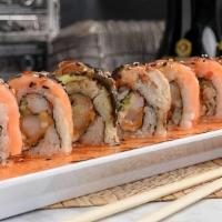 British Invasion Roll · Shrimp tempura, crab stick, cream cheese and cucumber inside, smoke salmon, baked eel, and a...
