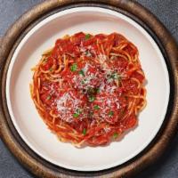 Spaghetti & Meatballs · Fresh spaghetti in our house made garlic marinara sauce paired with meatballs and topped wit...