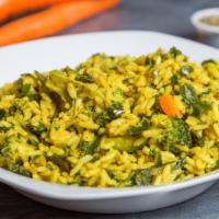 Veggie Rice  · Vegan. Chef’s specialty rice cooked with collard greens, broccoli, and carrots in ginger and...