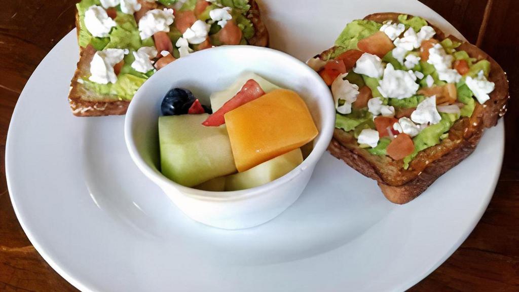 Avocado Toast · New, vegetarian. Mashed avocado mixed with our lemon garlic dressing spread over two pieces of multi-grain toast. Topped with creamy goat cheese and pico de gallo with a side of fresh fruit. 750 cal.