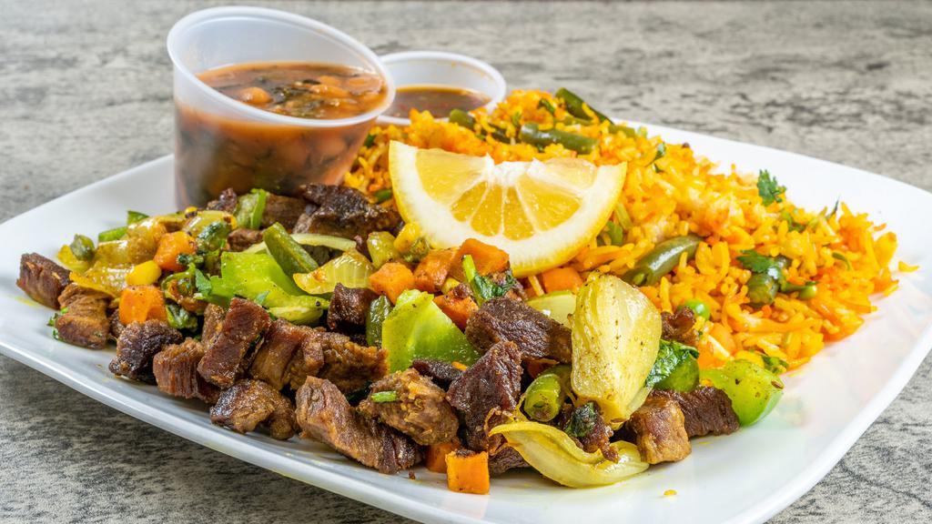 Beef Suqaar · Chopped, stir-fried, tender beef, sautéed with mixed vegetables, green peppers, onions, and cilantro