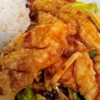 Crispy Catfish · Two boneless catfish filets, fried to a succulent tender and served with a Thai ginger soy s...