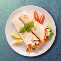 Shredded Chicken Gyro Wrap · Marinated spiced chicken, grilled to perfection, served with onino, siracha sauce cucumber s...