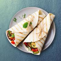 Grilled Vegetarian Wrap  · Stuffed with fresh, grilled vegetables cucumber sauce, red onin, black olives, feta cheese, ...