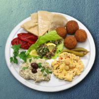 Vegetarian Combo Dinner · Vegetarian combo dinner comes with fresh Greek salad, cucumber sauce, grape leaves and grill...