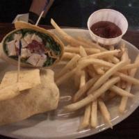 Grilled Chicken Caesar Wrap · Grilled chicken, lettuce, sundried tomato, red onions, Italian cheese and Caesar dressing. S...