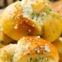 Garlic Knots · Rolled baked dough.