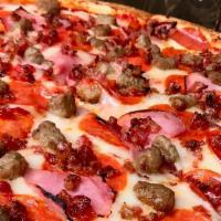 Meat Lovers (12”) · Pepperoni, sausage, ham, Canadian bacon and ground beef.