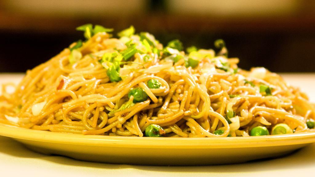 Hakka Noodle · Vegetarian. Noodles stir-fried with chopped vegetables, ginger, garlic, soy sauce and tomato sauce.