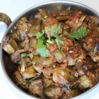 Bendi Masala · Vegetarian, gluten-free. Tender okra sauté with onions, peppers, tomatoes, herbs, and spices.