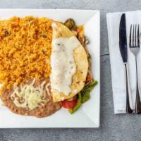 Fajita Quesadilla · Grilled chicken, steak, or both. Served with rice and beans.