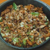 Choriqueso · New! Served on a hot skillet. Cheese sauce mixed with chorizo (Mexican sausage) and fresh di...