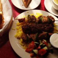 Istanbul Special · Beef shish, chicken shish, kofte kebob, served with rice, salad, pita, and soup.