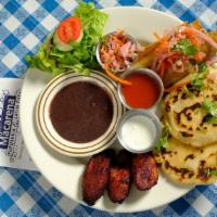 Pupusas & Flautas · Two traditional pupusas & two organic chicken flautas. Served with beans & plantains.